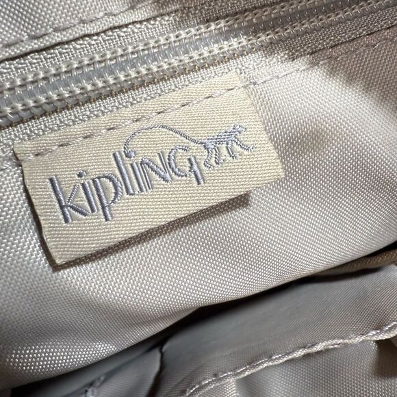 Kipling Gold Crossbody Bag with Adjustable Strap and Textured Finish - Picture 11 of 15